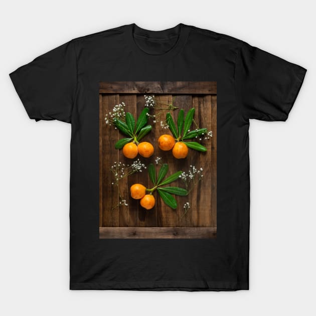 fresh and ripe yellow medlars T-Shirt by graphic3000